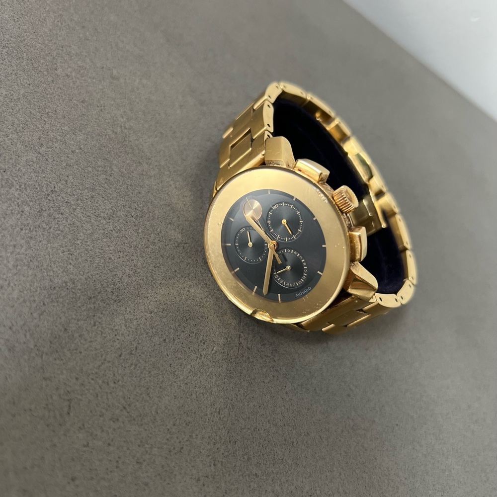Movado Bold mens gold watch with black dial